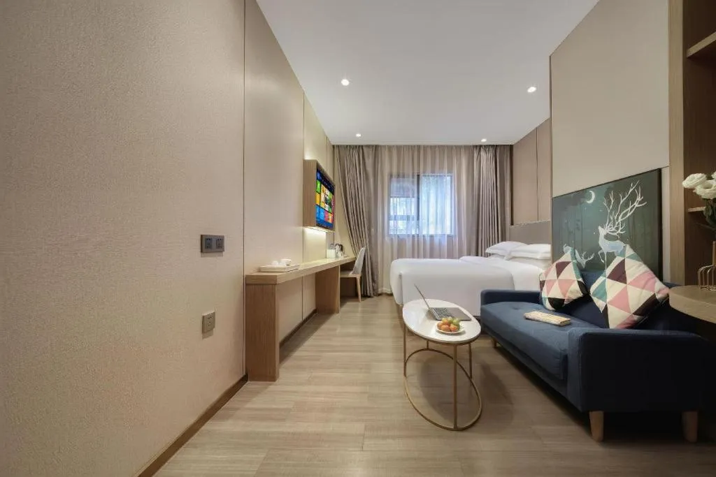 Bed in Echarm Hotel Guangzhou Gangding Huashi Metro Station