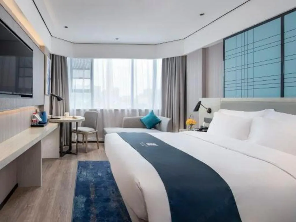 Bed in Echarm Hotel Shenzhen International Exhibition Center Fuyong