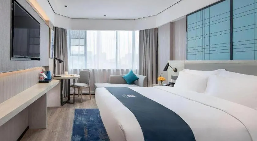 Bed in Echarm Hotel Shenzhen International Exhibition Center Fuyong