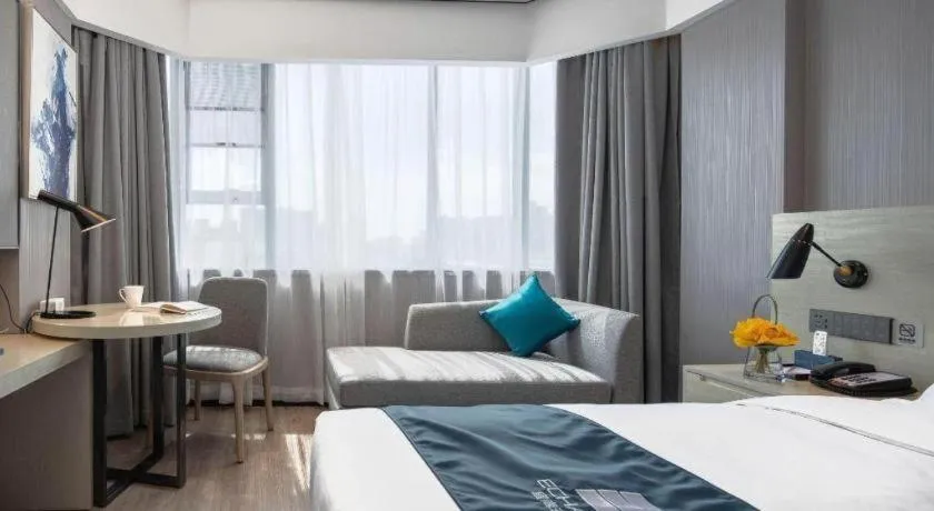 Bed in Echarm Hotel Shenzhen International Exhibition Center Fuyong