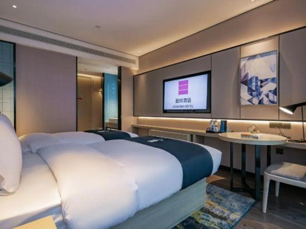 Bed in Echarm Hotel Shenzhen International Exhibition Center Fuyong