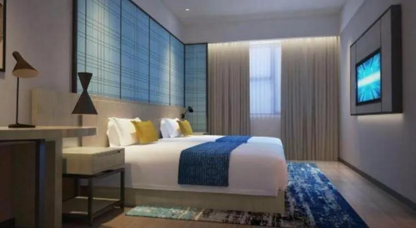 Bed in Echarm Hotel Shenzhen International Exhibition Center Fuyong