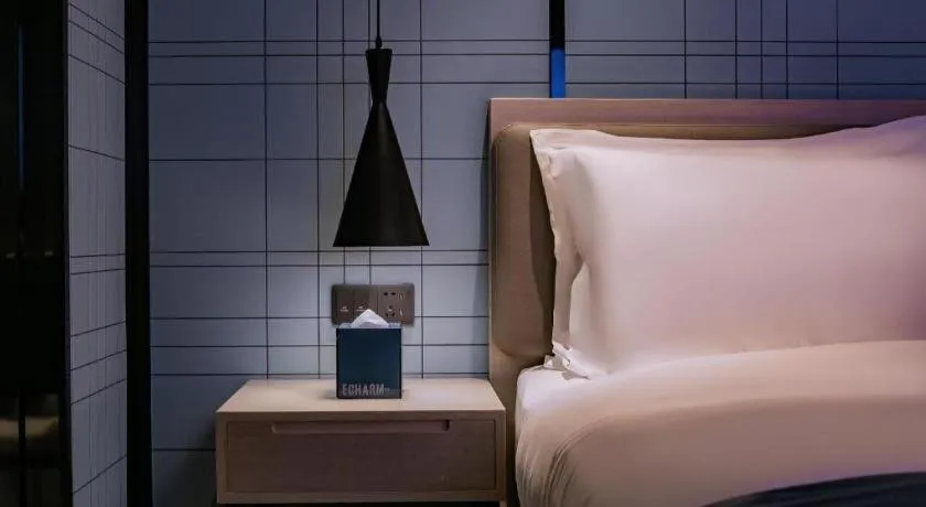 Bed in Echarm Hotel Shenzhen International Exhibition Center Fuyong