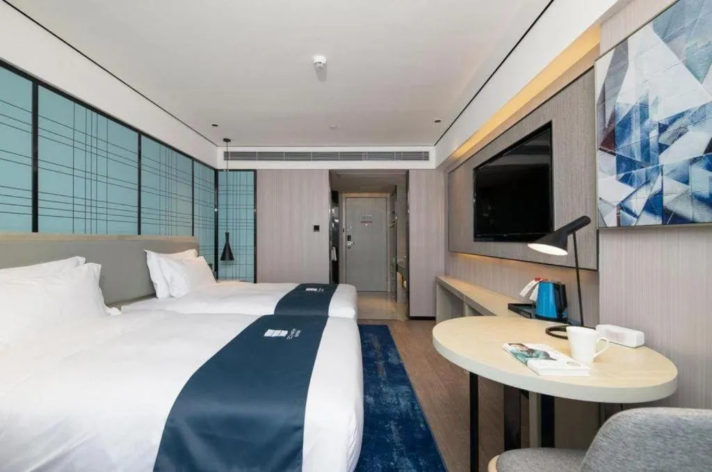 Bed in Echarm Hotel Shenzhen International Exhibition Center Fuyong