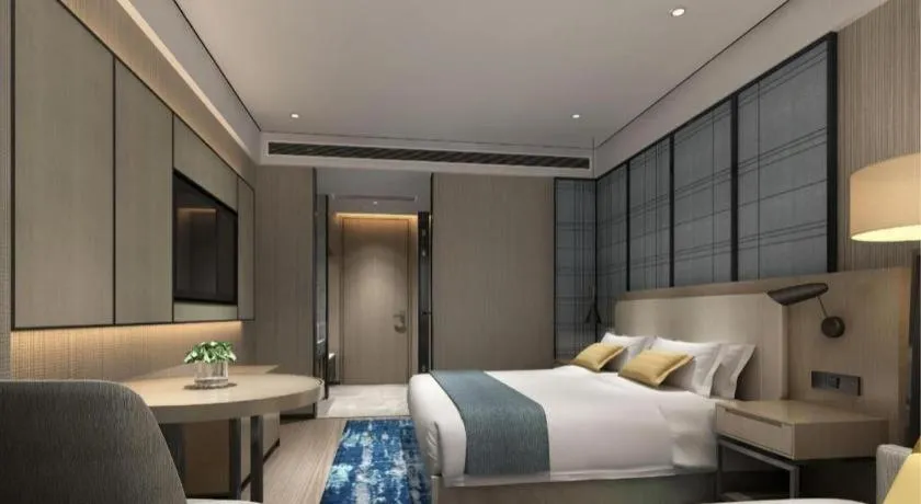 Bed in Echarm Hotel Shenzhen International Exhibition Center Fuyong