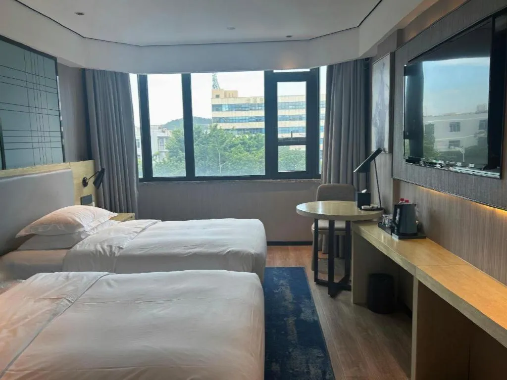 Bed in Echarm Hotel Shenzhen International Exhibition Center Fuyong