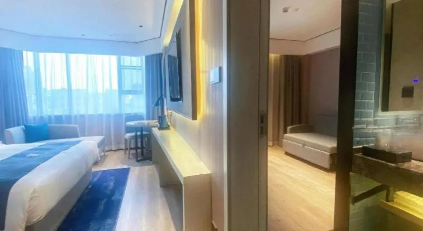 Bed in Echarm Hotel Shenzhen International Exhibition Center Fuyong