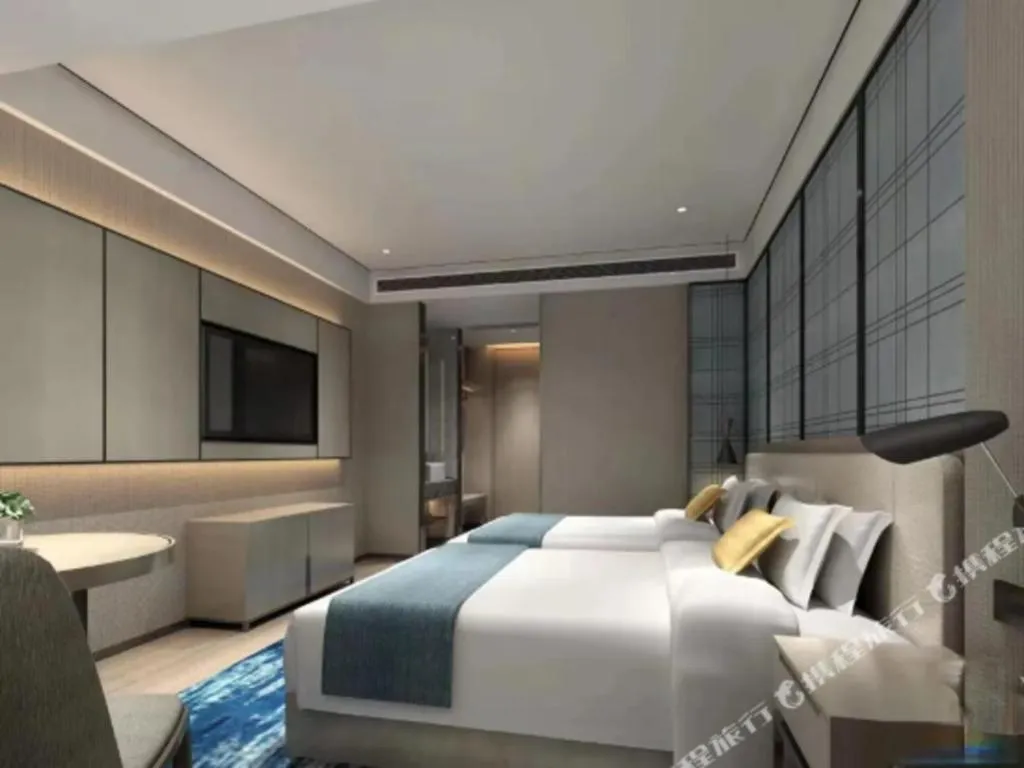 Bed in Echarm Hotel Shenzhen International Exhibition Center Fuyong