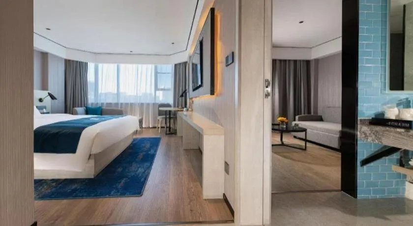 Bed in Echarm Hotel Shenzhen International Exhibition Center Fuyong