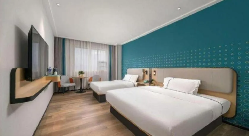 Bed in Echarm Hotel Shenzhen International Exhibition Center Fuyong