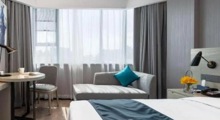 Bed in Echarm Hotel Shenzhen International Exhibition Center Fuyong