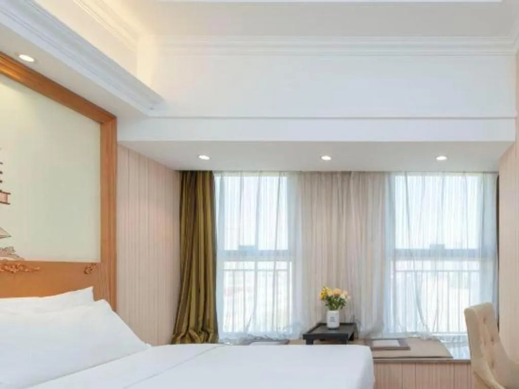 Bed in Vienna Hotel Zhengzhou Only Henan Movie Town