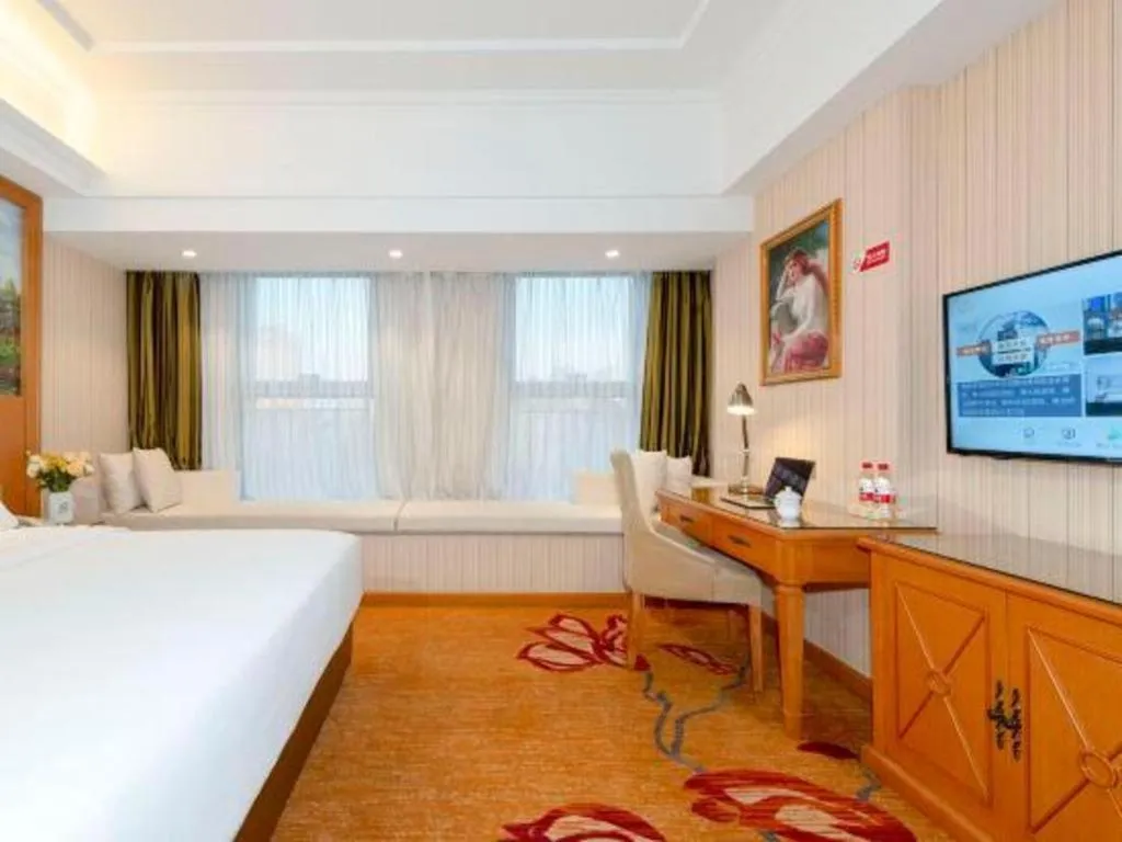 Bed in Vienna Hotel Zhengzhou Only Henan Movie Town