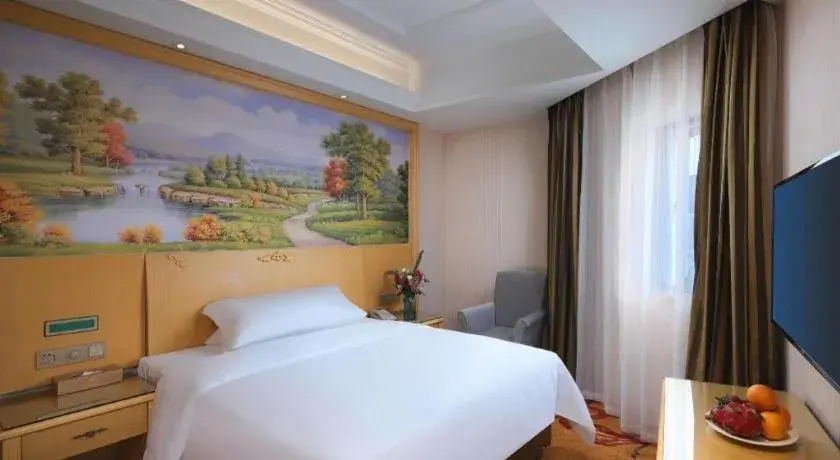 Bed in Vienna Hotel Hangzhou Jiubao Sijiqing Suanli Town Bed in Vienna Hotel Hangzhou Jiubao Sijiqing Suanli Town