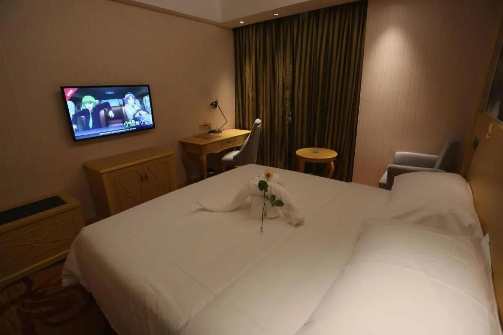 Bed in Vienna Hotel Hangzhou Jiubao Sijiqing Suanli Town