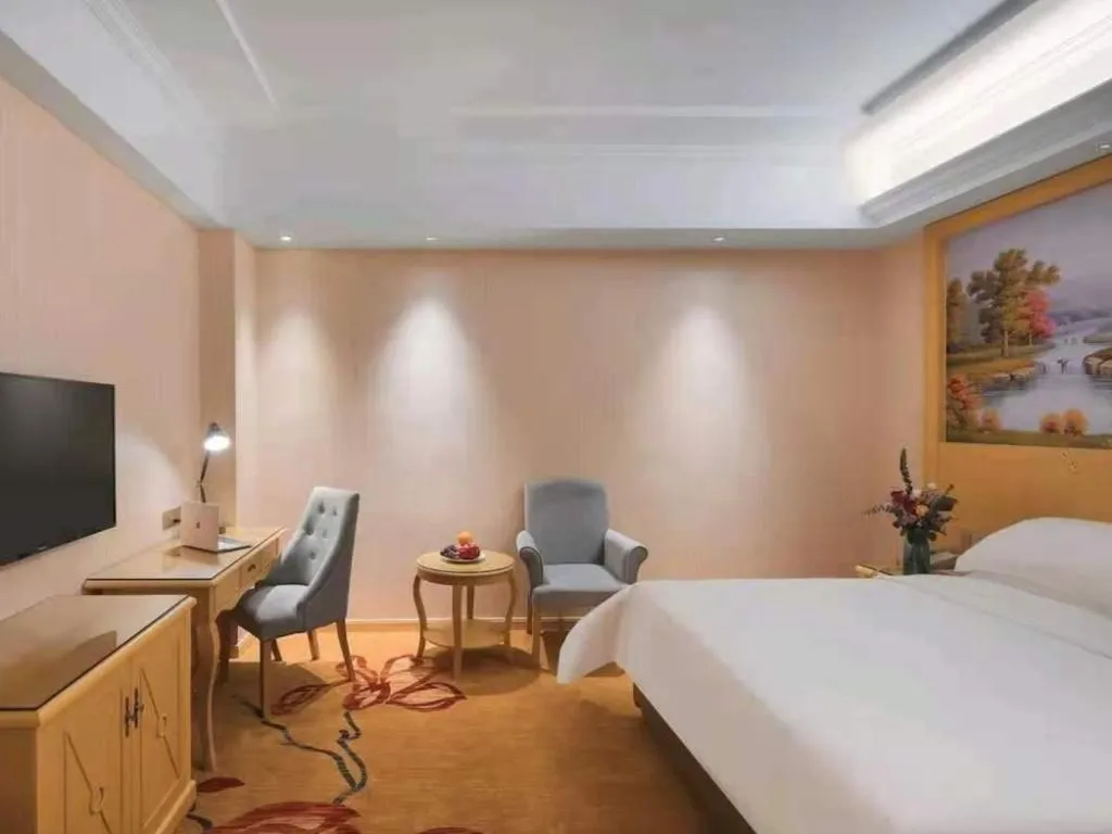 Bed in Vienna Hotel Hangzhou Jiubao Sijiqing Suanli Town