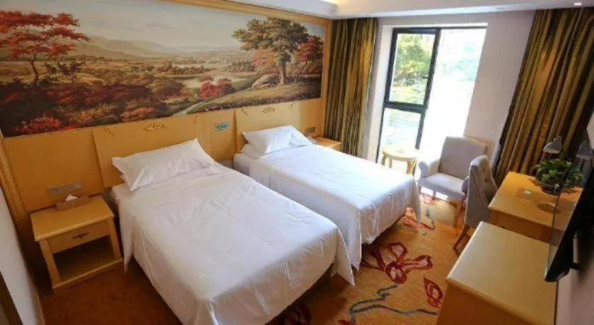 Bed in Vienna Hotel Hangzhou Jiubao Sijiqing Suanli Town