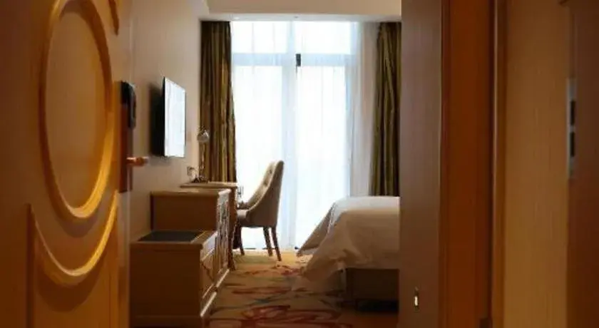 Bed in Vienna Hotel Hangzhou Jiubao Sijiqing Suanli Town Bed in Vienna Hotel Hangzhou Jiubao Sijiqing Suanli Town