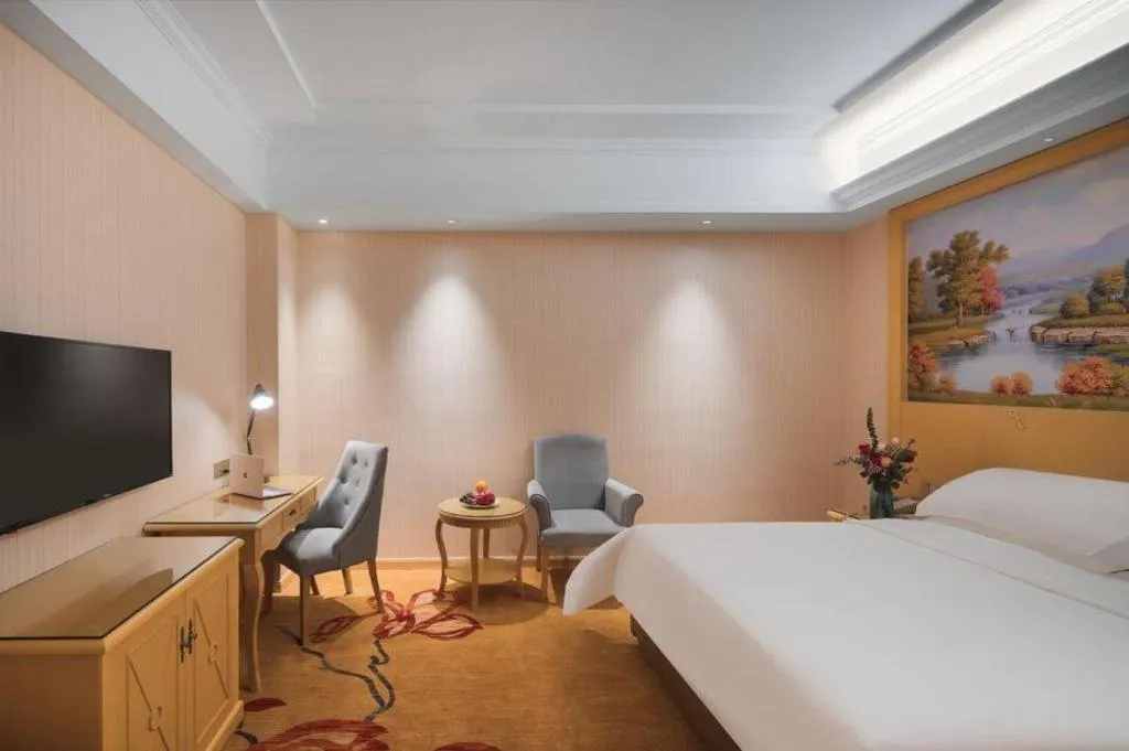 Bed in Vienna Hotel Hangzhou Jiubao Sijiqing Suanli Town