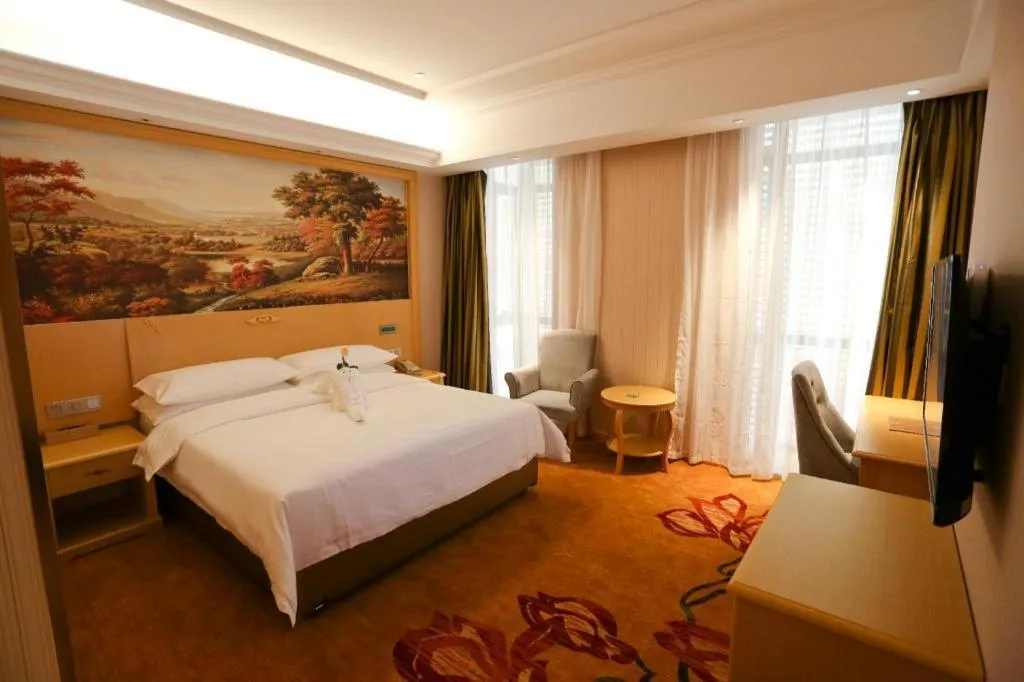 Bed in Vienna Hotel Hangzhou Jiubao Sijiqing Suanli Town