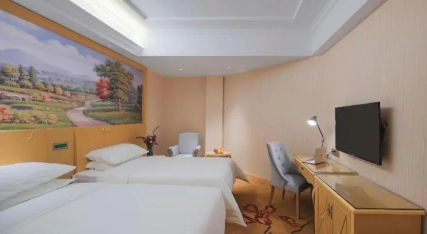 Bed in Vienna Hotel Hangzhou Jiubao Sijiqing Suanli Town