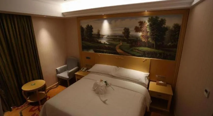 Bed in Vienna Hotel Hangzhou Jiubao Sijiqing Suanli Town