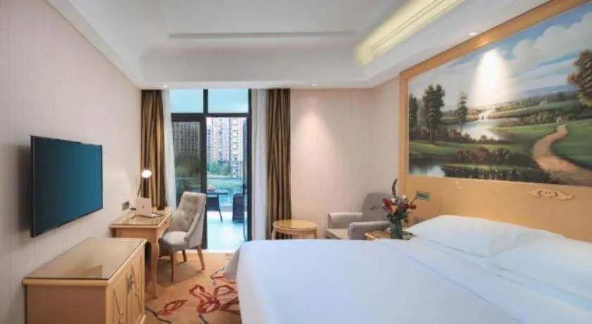 Bed in Vienna Hotel Hangzhou Jiubao Sijiqing Suanli Town