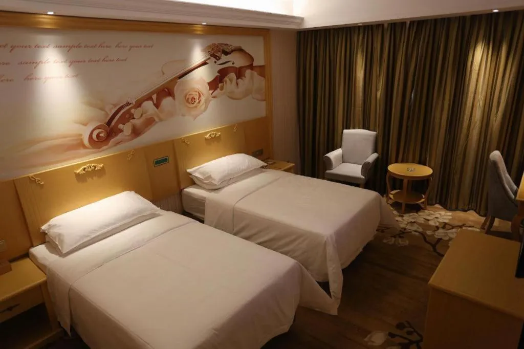 Bed in Vienna Hotel Hangzhou Jiubao Sijiqing Suanli Town