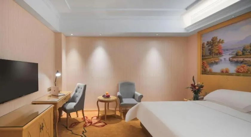 Bed in Vienna Hotel Hangzhou Jiubao Sijiqing Suanli Town