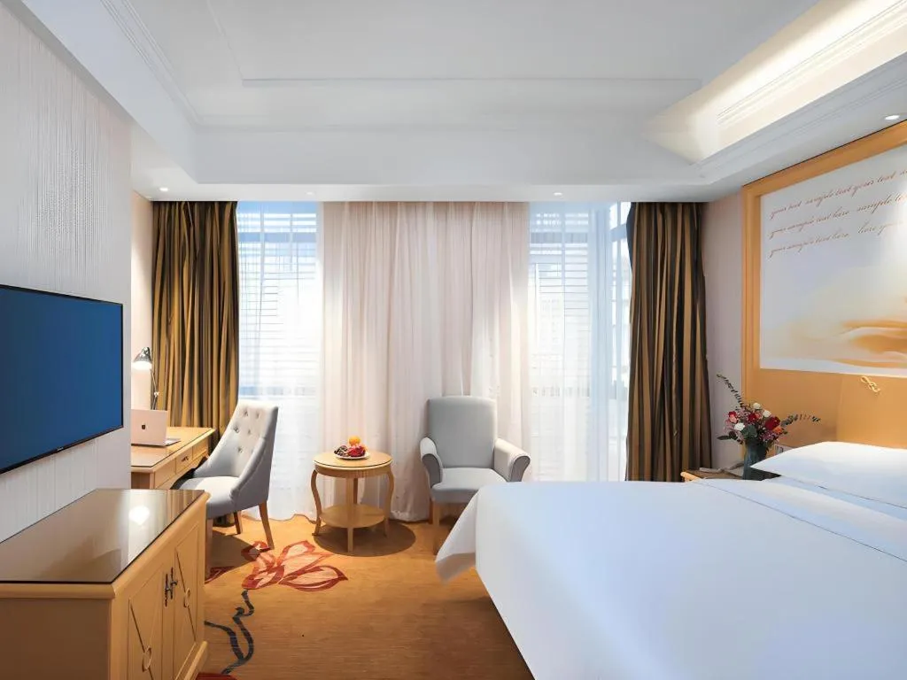 Bed in Vienna Hotel Hangzhou Jiubao Sijiqing Suanli Town