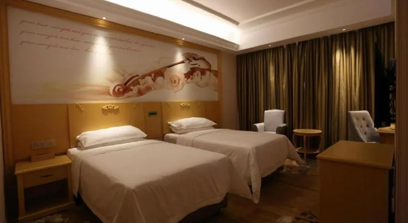 Bed in Vienna Hotel Hangzhou Jiubao Sijiqing Suanli Town