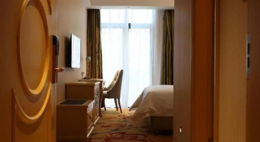 Bed in Vienna Hotel Hangzhou Jiubao Sijiqing Suanli Town