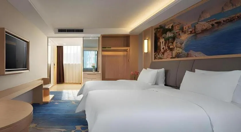 Bed in Vienna Hotel Guangzhou Yonghe Development Zone