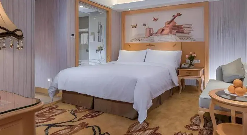 Bed in Vienna Hotel Shenzhen Qinghu Metro Station Bed in Vienna Hotel Shenzhen Qinghu Metro Station