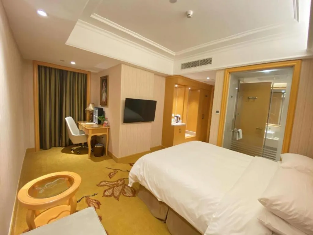 Bed in Vienna Hotel Shenzhen Qinghu Metro Station