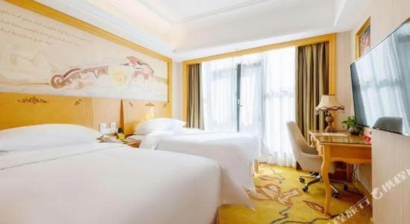 Bed in Vienna Hotel Shenzhen Qinghu Metro Station