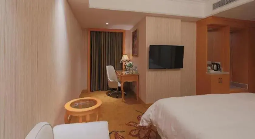 Bed in Vienna Hotel Shenzhen Qinghu Metro Station Bed in Vienna Hotel Shenzhen Qinghu Metro Station