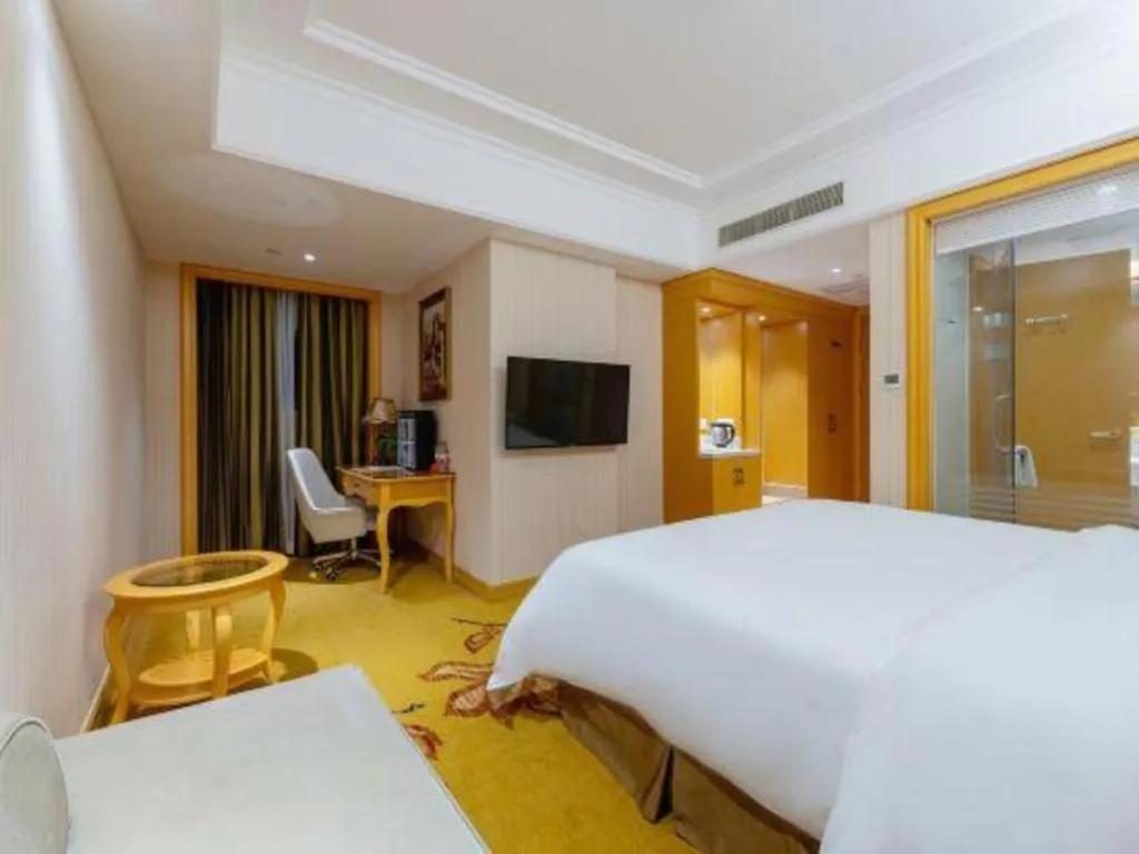 Bed in Vienna Hotel Shenzhen Qinghu Metro Station