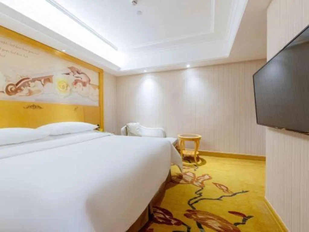 Bed in Vienna Hotel Shenzhen Qinghu Metro Station