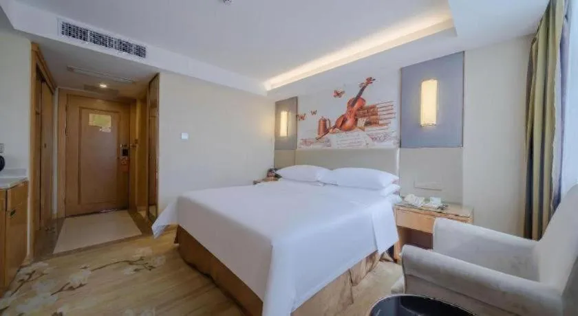 Bed in Vienna Hotel Shenzhen Guanlan Shanshuitianyuan Xintian