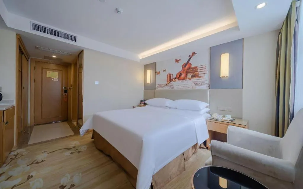 Bed in Vienna Hotel Shenzhen Guanlan Shanshuitianyuan Xintian