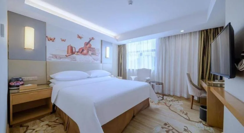 Bed in Vienna Hotel Shenzhen Guanlan Shanshuitianyuan Xintian
