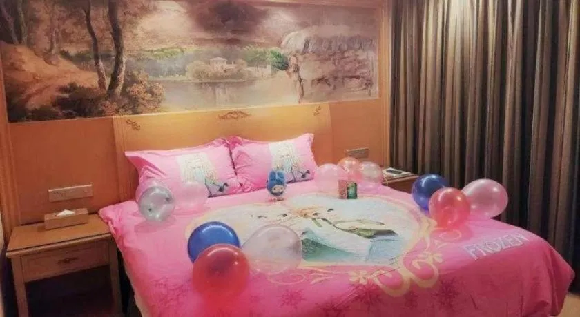 Bed in Vienna Hotel Shenzhen Guanlan Shanshuitianyuan Xintian