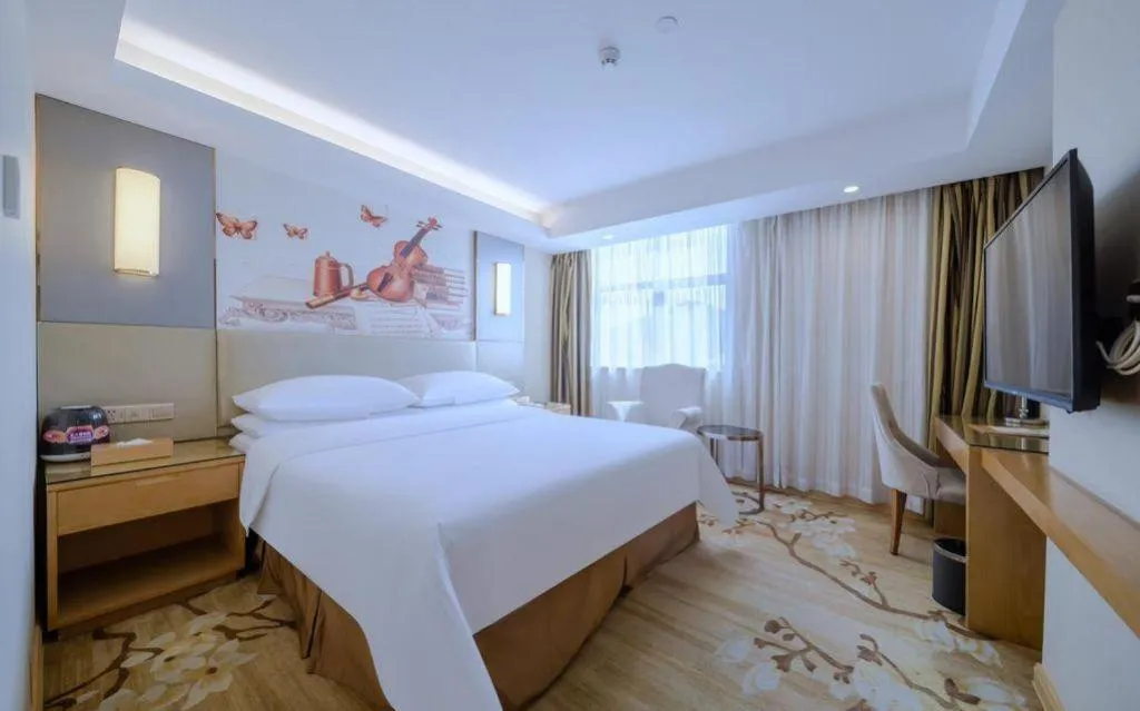 Bed in Vienna Hotel Shenzhen Guanlan Shanshuitianyuan Xintian