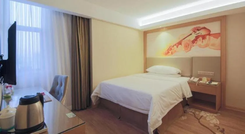 Bed in Vienna Hotel Shenzhen Guanlan Shanshuitianyuan Xintian