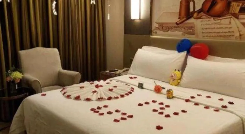 Bed in Vienna Hotel Shenzhen Guanlan Shanshuitianyuan Xintian