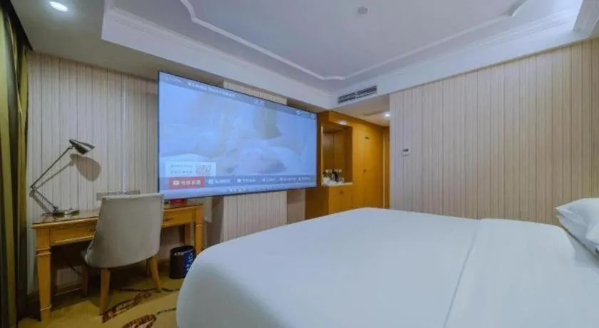 Bed in Vienna Hotel Shenzhen Guanlan Shanshuitianyuan Xintian