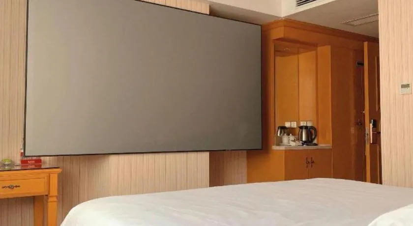 Bed in Vienna Hotel Shenzhen Guanlan Shanshuitianyuan Xintian