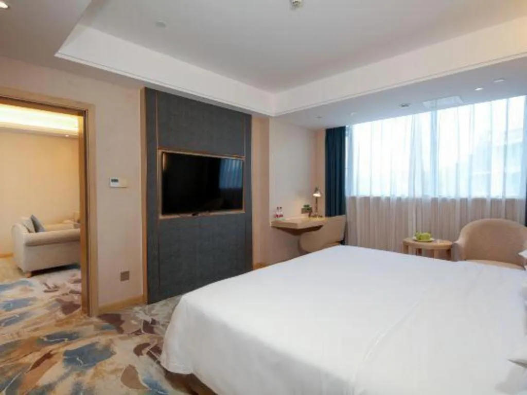 Bed in Vienna Hotel Chengdu Xinjin Old Pier Liujianian Metro Station