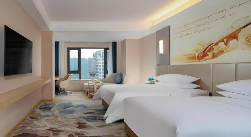 Bed in Vienna Hotel Chengdu Xinjin Old Pier Liujianian Metro Station